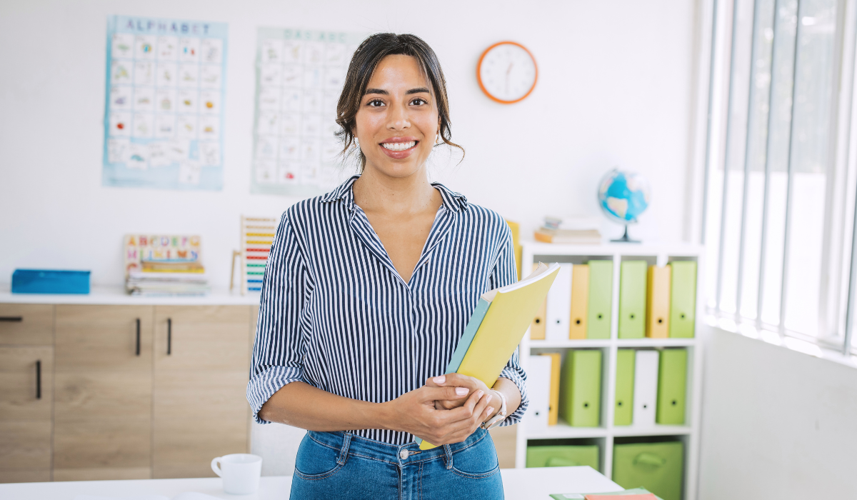 Teacher smiling in classroom