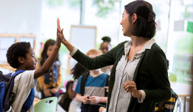 teacher-and-student-high-fiving-smaller