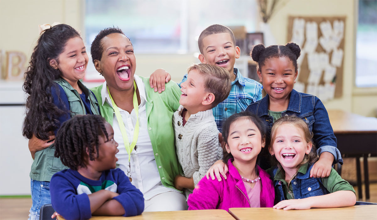 teacher-laughing-with-students